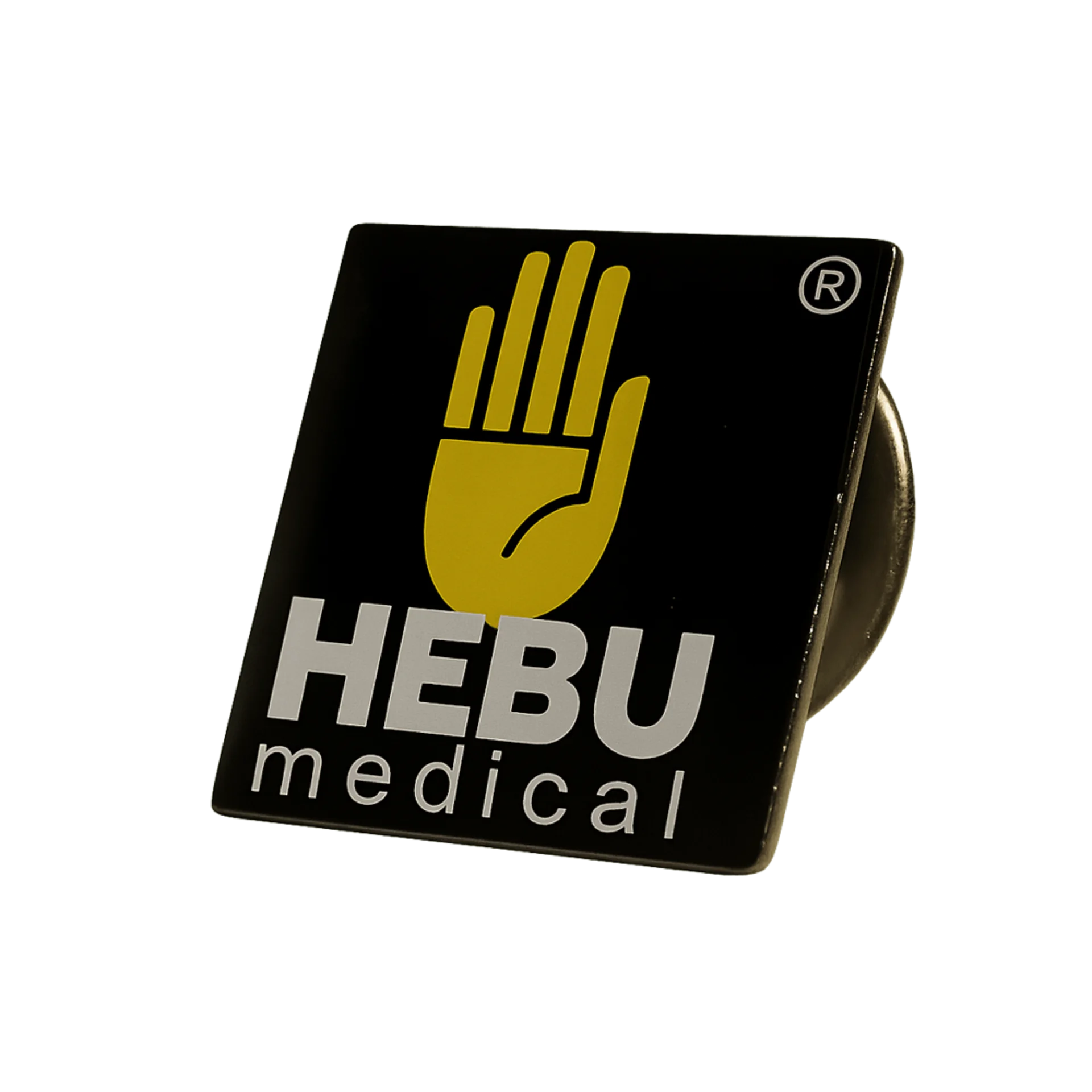 HEBUmedical – Logo-Pin für Fans und Kunden HEBUmedical Logo-Pin in Schwarz und Gelb für Merchandising und Unternehmenspräsentation